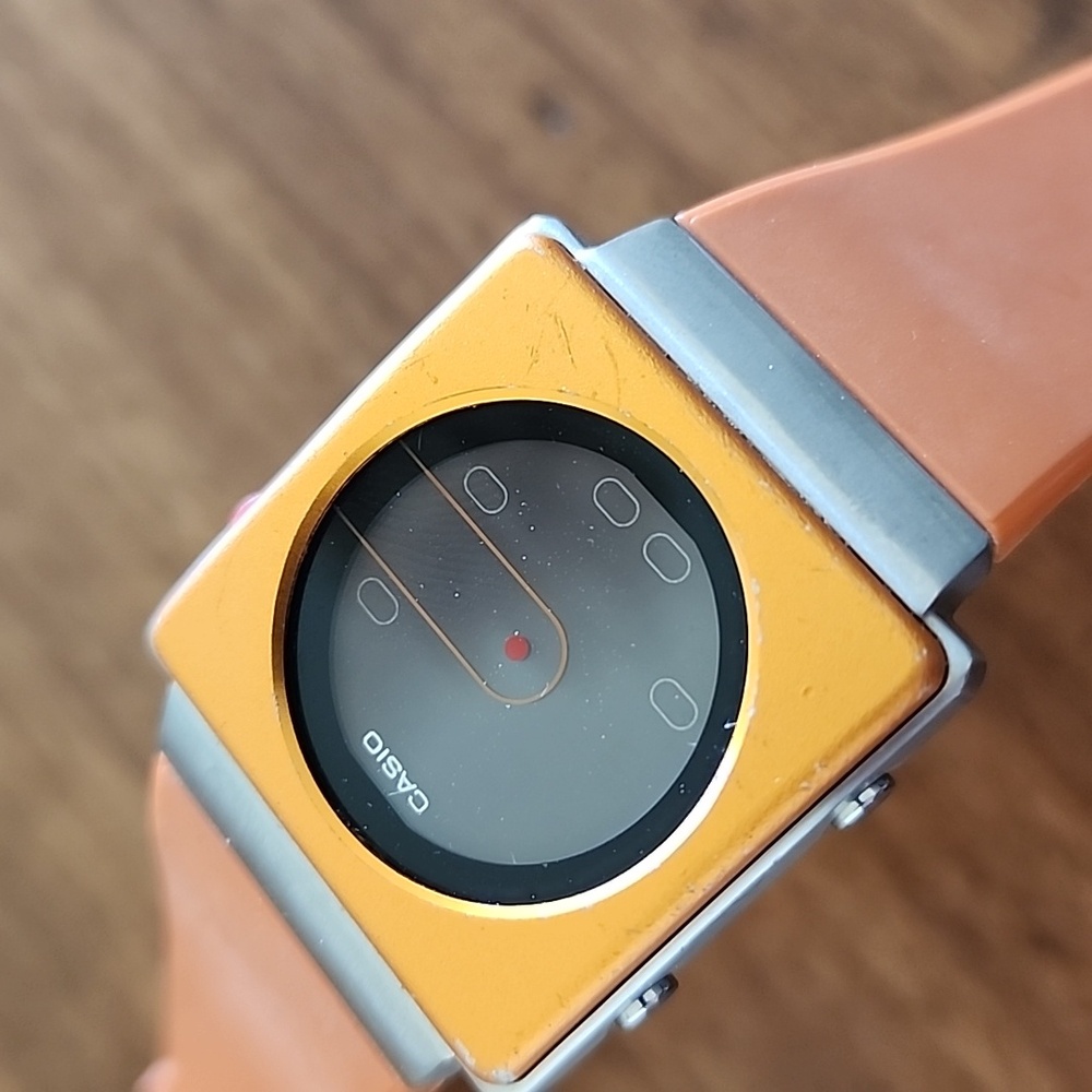 Casio Futurist Watch with Orange and Silver Accents